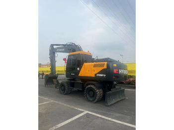 Excavadora de ruedas HYUNDAI R210