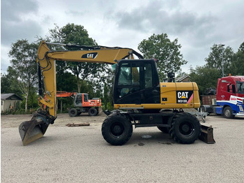 Excavadora de ruedas CATERPILLAR M313D