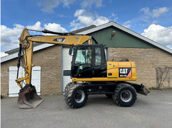 Excavadora de ruedas CATERPILLAR M313D