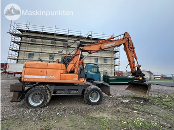 Excavadora de ruedas Doosan DX 140 W med vagn och redskap: foto 3