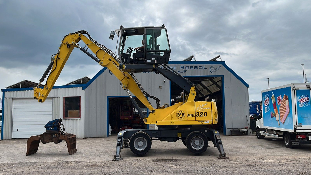 Fuchs TeRex MHL 320 D Umschlagbagger Greifer Pratzen - Manipulador de materiales: foto 2 Fuchs TeRex MHL 320 D Umschlagbagger Greifer Pratzen - Manipulador de materiales: foto 2