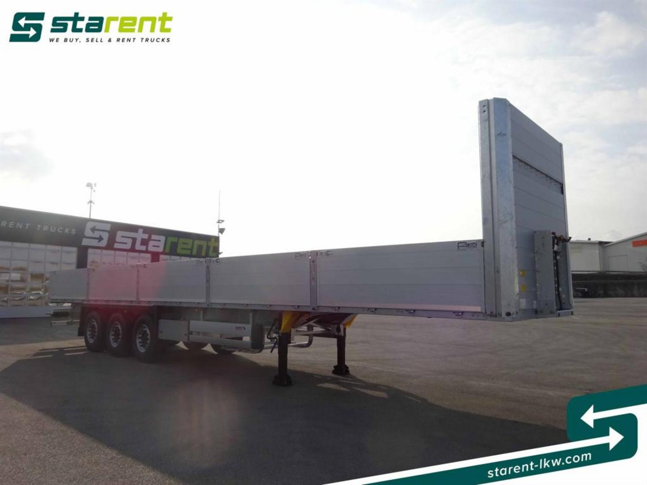 Schmitz Baustofftrailer Liftachse Rungen 80cm Bordwände - Semirremolque plataforma/ Caja abierta: foto 3 Schmitz Baustofftrailer Liftachse Rungen 80cm Bordwände - Semirremolque plataforma/ Caja abierta: foto 3