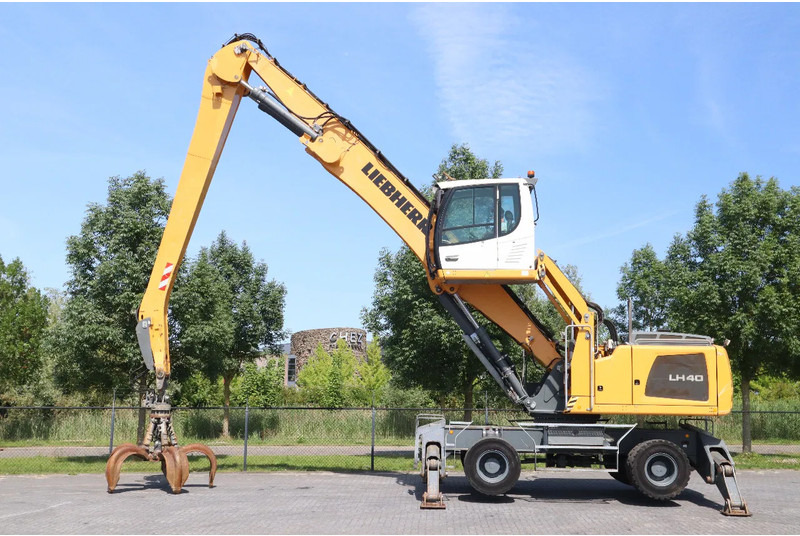 Liebherr LH 40 M LITRONIC | GRAB | QUICK COUPLER | 16 METER - Manipulador de materiales: foto 1 Liebherr LH 40 M LITRONIC | GRAB | QUICK COUPLER | 16 METER - Manipulador de materiales: foto 1