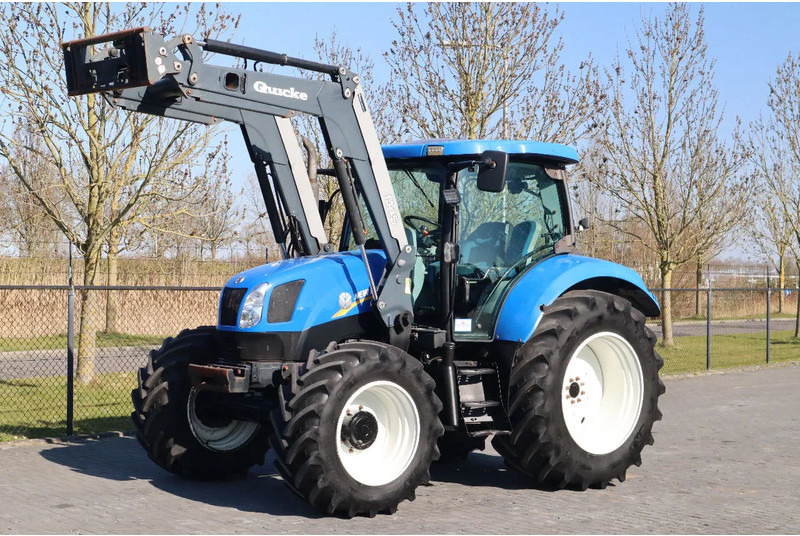 New Holland T6040 | FRONT LOADER | 50KM/H | QUICK COUPLER - Tractor: foto 1 New Holland T6040 | FRONT LOADER | 50KM/H | QUICK COUPLER - Tractor: foto 1