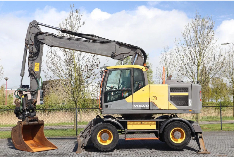 Volvo EW 220 E | TILTROTATOR | BUCKET | 2-PIECE | BSS - Excavadora de ruedas: foto 1 Volvo EW 220 E | TILTROTATOR | BUCKET | 2-PIECE | BSS - Excavadora de ruedas: foto 1