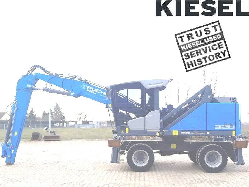 Fuchs MHL 320 F - Manipulador de materiales: foto 1 Fuchs MHL 320 F - Manipulador de materiales: foto 1