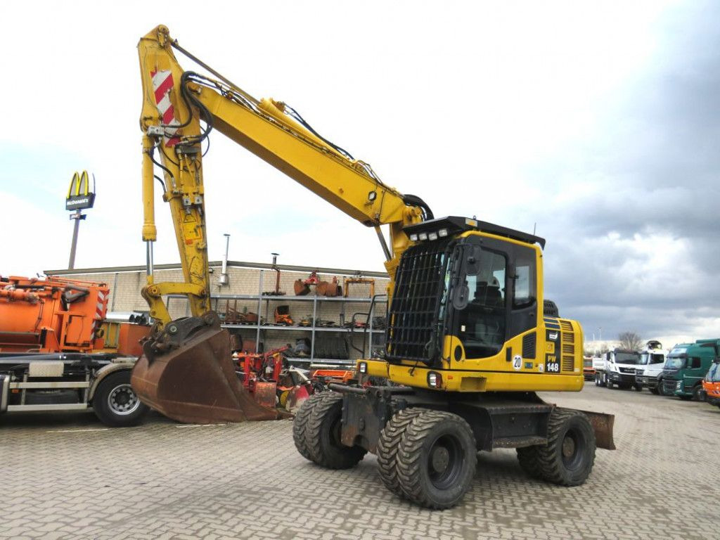 Komatsu Mobilbagger PW 148 - 8 Bagger 6.824h Deutsch top - Excavadora de ruedas: foto 1 Komatsu Mobilbagger PW 148 - 8 Bagger 6.824h Deutsch top - Excavadora de ruedas: foto 1