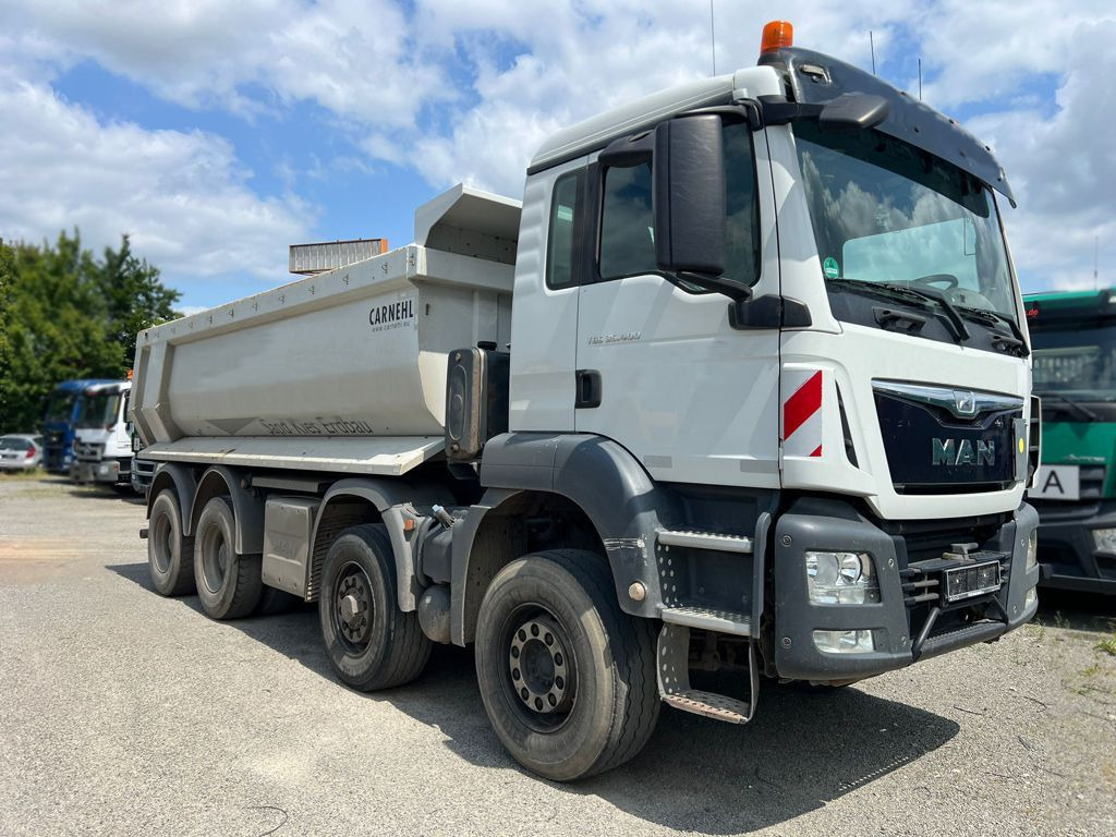 MAN TG-S 35.400 8x6H 4 Achs Muldenkipper Carnehl - Camión portacontenedor de cadenas: foto 2 MAN TG-S 35.400 8x6H 4 Achs Muldenkipper Carnehl - Camión portacontenedor de cadenas: foto 2