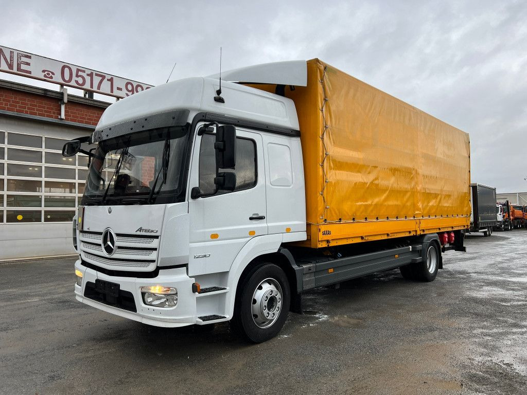Mercedes-Benz Atego 1230 L Pritsche LBW Lg.Fhs/Hochd. 7,2m+LBW - Camión caja abierta: foto 1 Mercedes-Benz Atego 1230 L Pritsche LBW Lg.Fhs/Hochd. 7,2m+LBW - Camión caja abierta: foto 1