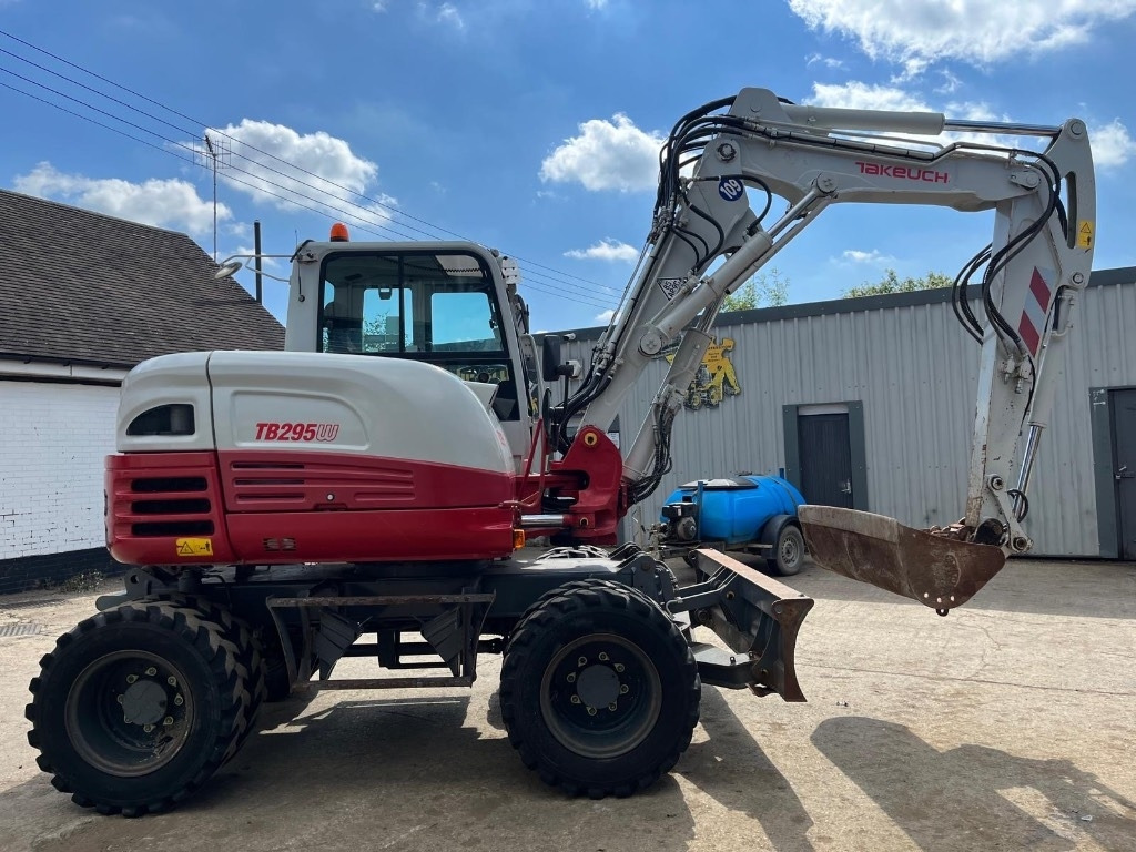 Takeuchi TB295W - Excavadora de ruedas: foto 1 Takeuchi TB295W - Excavadora de ruedas: foto 1