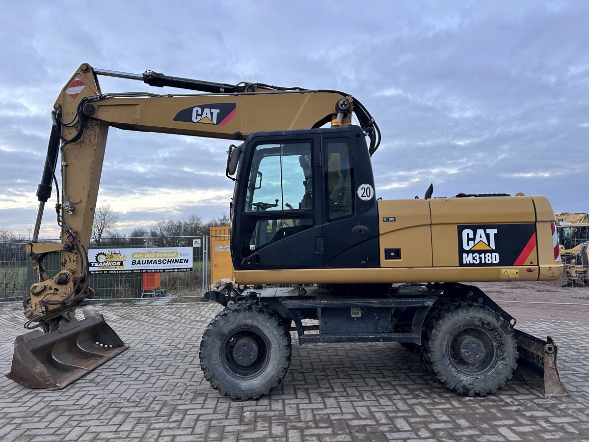 CATERPILLAR M 318 D full Hydr. Top Zustand German machine ! - Excavadora de ruedas: foto 1 CATERPILLAR M 318 D full Hydr. Top Zustand German machine ! - Excavadora de ruedas: foto 1