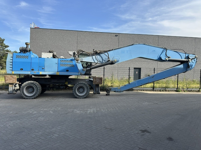 Fuchs MHL 360 OVERSLAGKRAAN / MATERIAL HANDLER / UMSCHLAGBAGGER - TOP ZUSTAND - Manipulador de materiales: foto 1 Fuchs MHL 360 OVERSLAGKRAAN / MATERIAL HANDLER / UMSCHLAGBAGGER - TOP ZUSTAND - Manipulador de materiales: foto 1