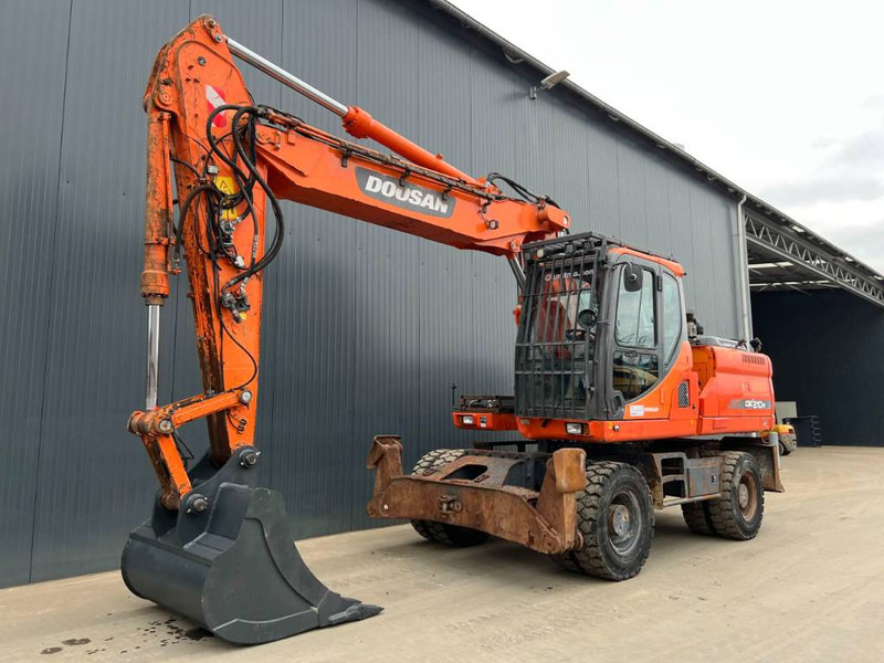 Doosan DX210W - Excavadora de ruedas: foto 1 Doosan DX210W - Excavadora de ruedas: foto 1