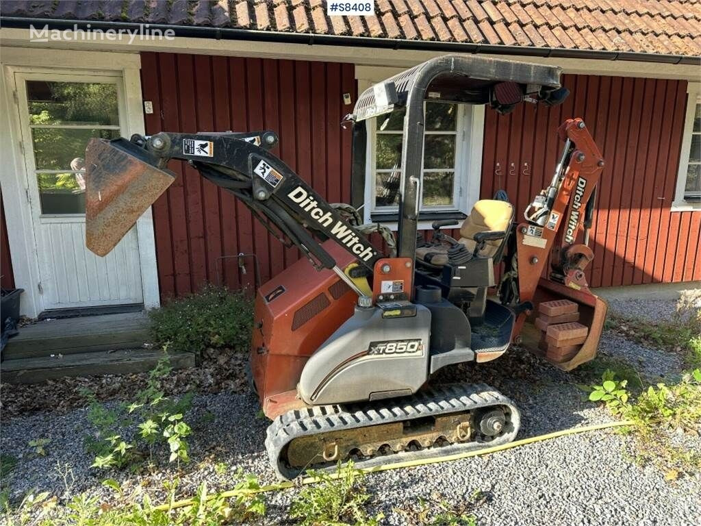 Retroexcavadora Ditch Witch XT850 with Front loader and Backhoe attachment: foto 1