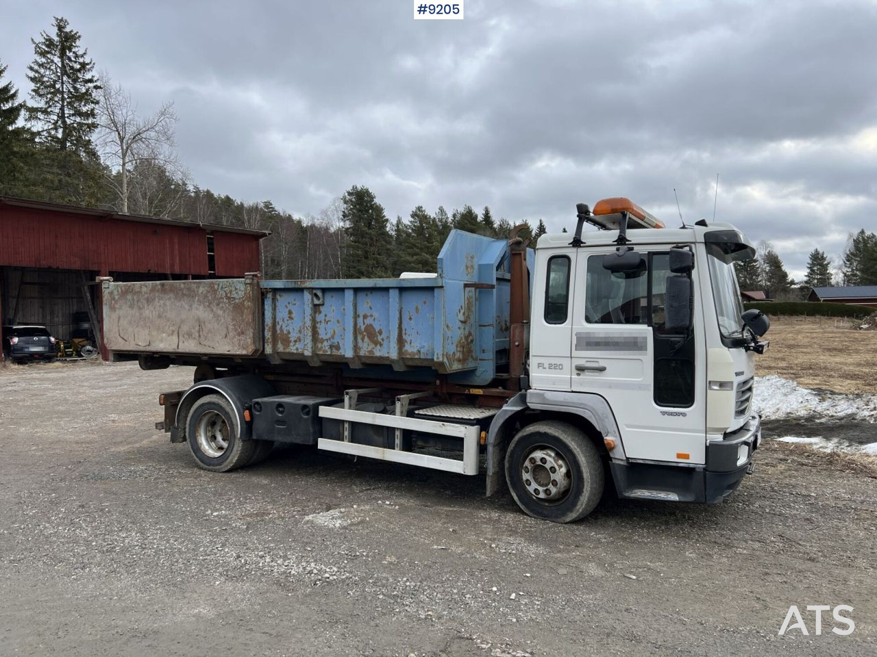 Volvo FL 6 4X2 Truncated hooklift with flatbed - Camión multibasculante: foto 1 Volvo FL 6 4X2 Truncated hooklift with flatbed - Camión multibasculante: foto 1