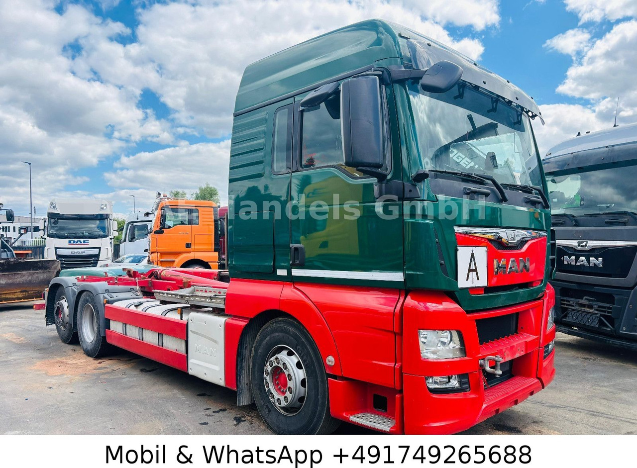 MAN TGX 26.440 XLX BL 6x2 *Retarder/MEILLER-RK-20.65 - Camión multibasculante, Camión grúa: foto 1 MAN TGX 26.440 XLX BL 6x2 *Retarder/MEILLER-RK-20.65 - Camión multibasculante, Camión grúa: foto 1
