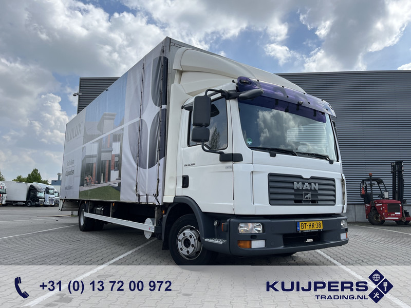 MAN TGL 12.180 / 12 Ton / 781 dkm / Oil Leak / Canvas Box / APK TUV 10-25 - Camión caja cerrada: foto 1 MAN TGL 12.180 / 12 Ton / 781 dkm / Oil Leak / Canvas Box / APK TUV 10-25 - Camión caja cerrada: foto 1