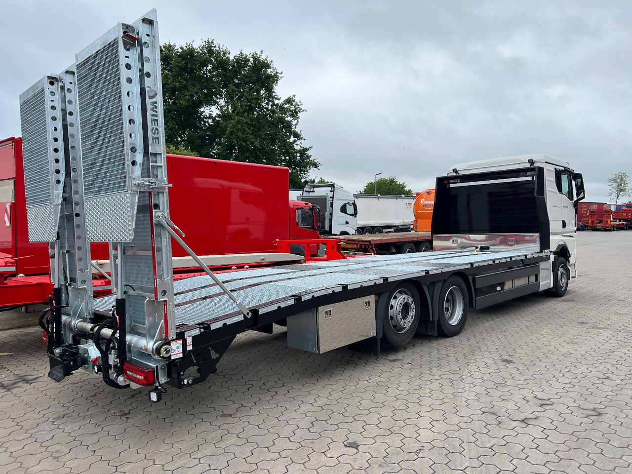 MAN Baumaschinen-  Arbeitsbühnentransporter Rampen - Grua de remolque autos: foto 5 MAN Baumaschinen-  Arbeitsbühnentransporter Rampen - Grua de remolque autos: foto 5