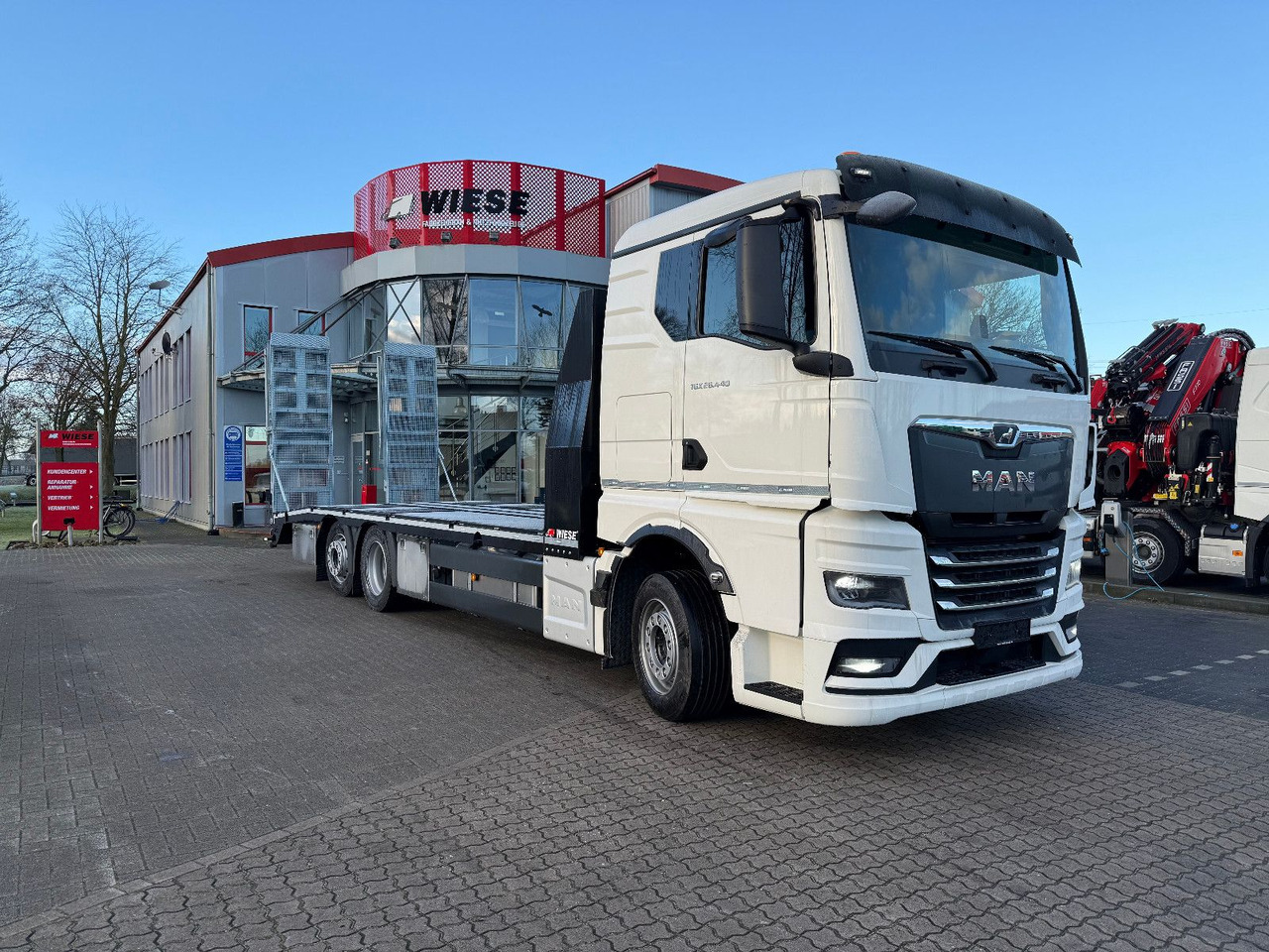 MAN Baumaschinen- Arbeitsbühnentransporter Rampen - Camión portavehículos: foto 2 MAN Baumaschinen- Arbeitsbühnentransporter Rampen - Camión portavehículos: foto 2