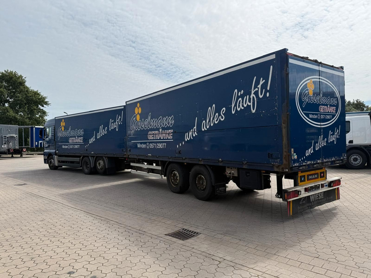 Camión transporte de bebidas MAN TGA mit Kofferaufbau/Getränkeaufbau + Anhänger: foto 12