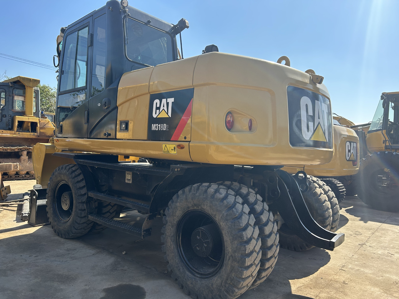CATERPILLAR M318 - Excavadora de ruedas: foto 1 CATERPILLAR M318 - Excavadora de ruedas: foto 1