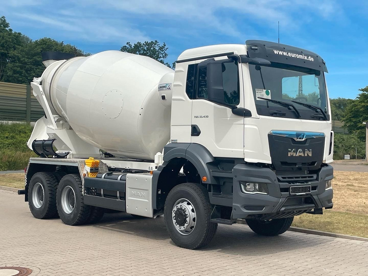 MAN TGS 33.440 / 6X6 Euro6e Euromix MTP EM 7 L - Camión hormigonera: foto 1 MAN TGS 33.440 / 6X6 Euro6e Euromix MTP EM 7 L - Camión hormigonera: foto 1
