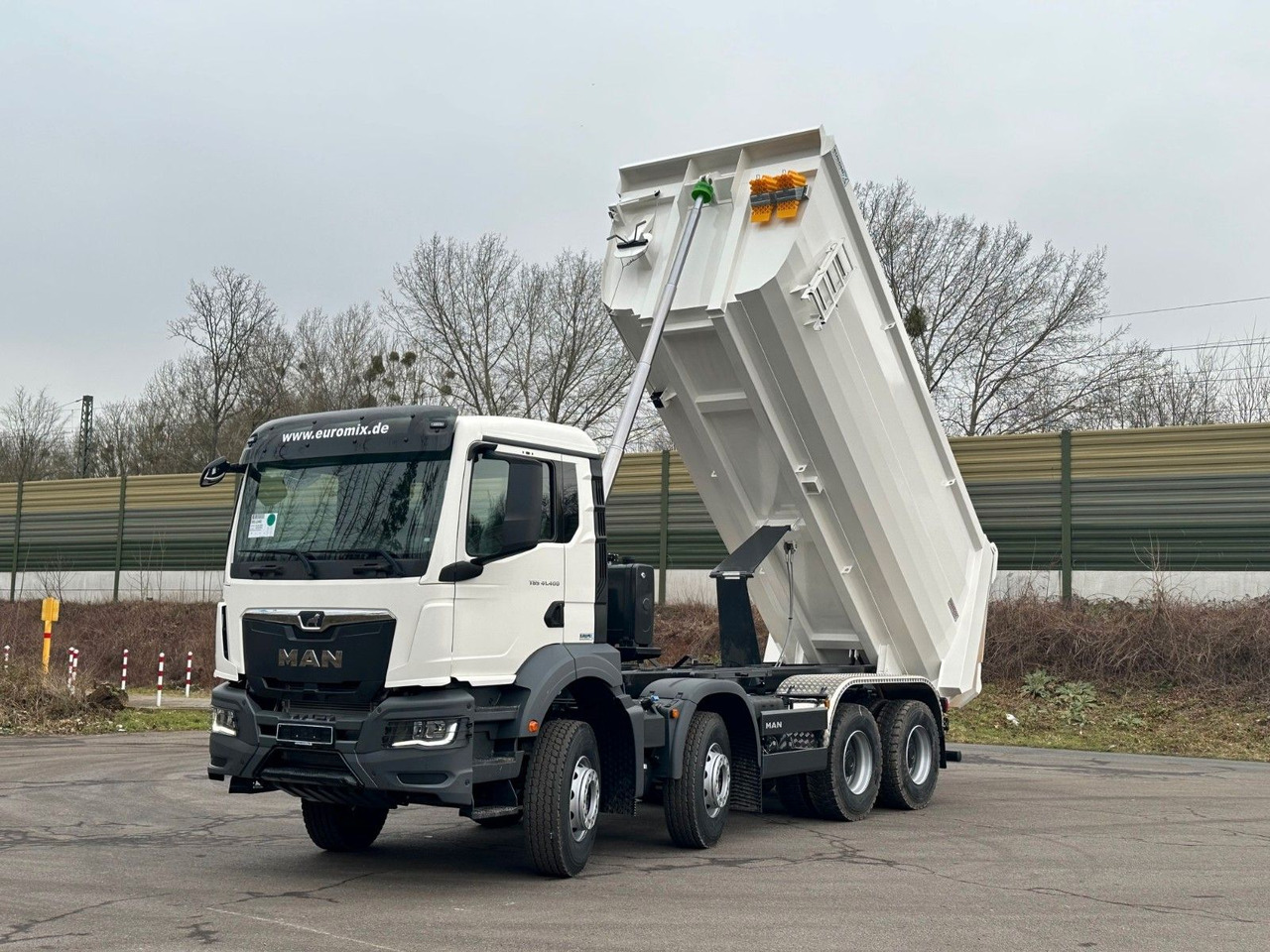 MAN TGS 41.400 8x4 / EUROMIX MTP 20m³/ EURO 5 - Camión portacontenedor de cadenas: foto 2 MAN TGS 41.400 8x4 / EUROMIX MTP 20m³/ EURO 5 - Camión portacontenedor de cadenas: foto 2