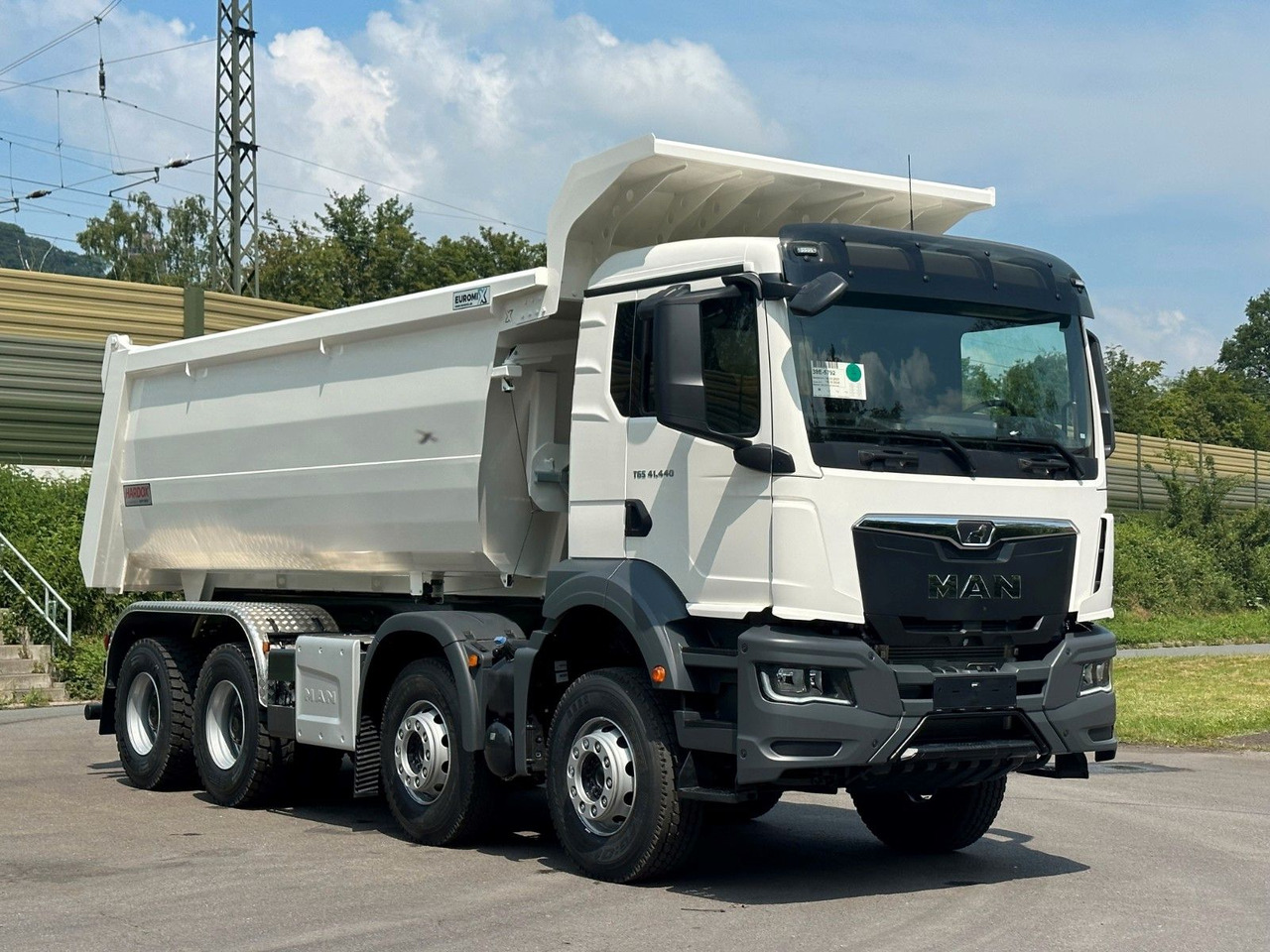 MAN TGS 41.440 8x4 EuromixMTP Mulden-Kipper - Camión volquete: foto 1 MAN TGS 41.440 8x4 EuromixMTP Mulden-Kipper - Camión volquete: foto 1
