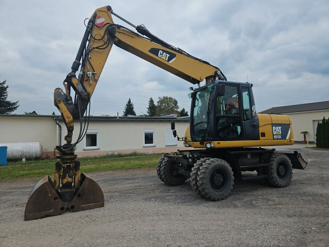 CAT M315D orig. 4.129h - Excavadora de ruedas: foto 1 CAT M315D orig. 4.129h - Excavadora de ruedas: foto 1
