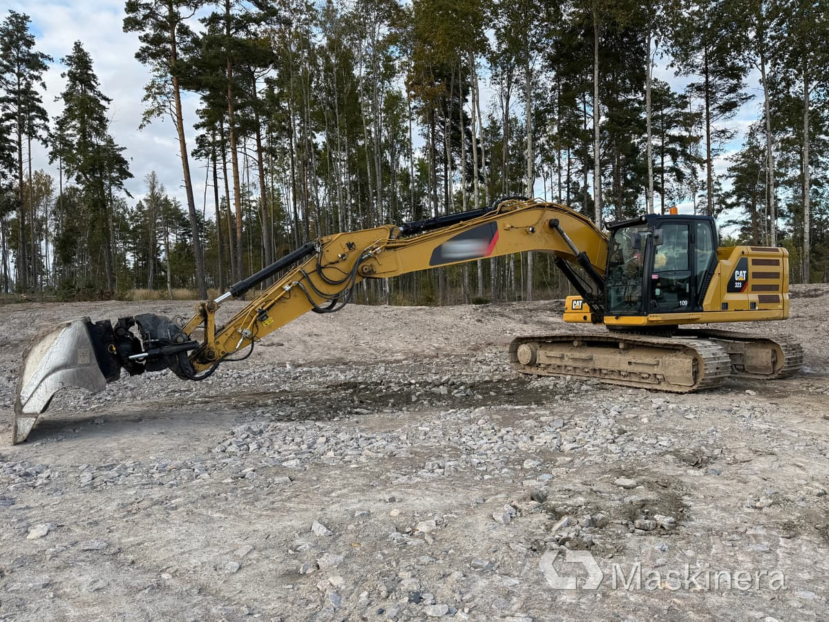 Grävmaskin CAT 323 Next Generation - Excavadora de cadenas: foto 1 Grävmaskin CAT 323 Next Generation - Excavadora de cadenas: foto 1