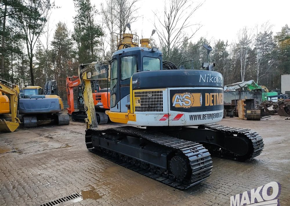 Komatsu PC228USLC-3 - Excavadora de cadenas: foto 2 Komatsu PC228USLC-3 - Excavadora de cadenas: foto 2
