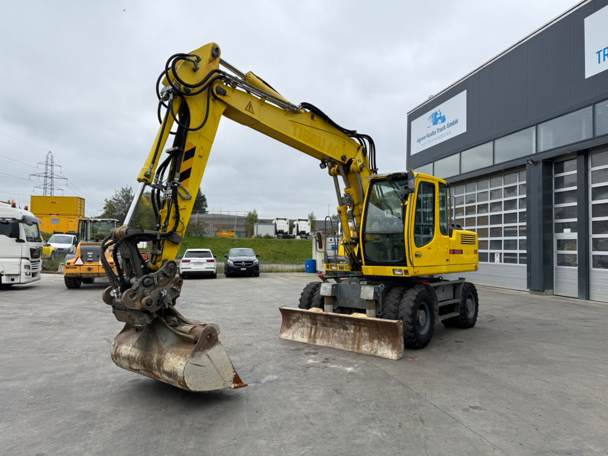 LIEBHERR 900 C 3xBuckets - Excavadora de ruedas: foto 1 LIEBHERR 900 C 3xBuckets - Excavadora de ruedas: foto 1