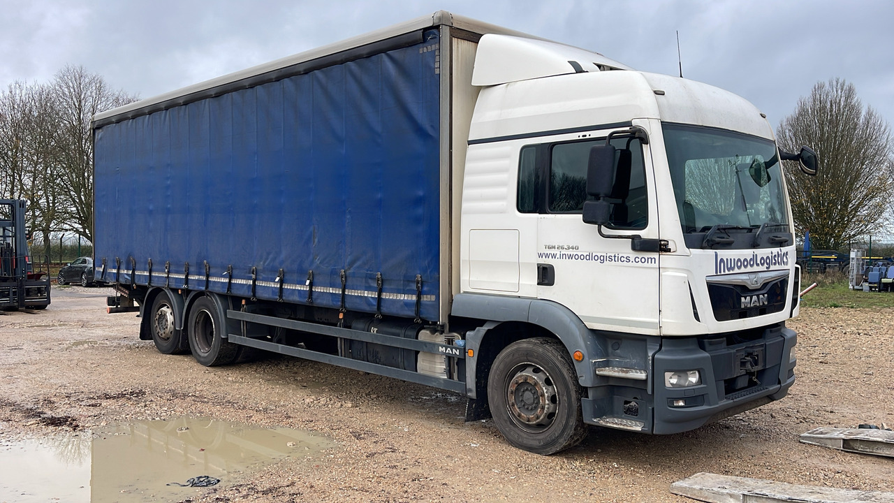 MAN TGM 26.340 - Camión lona: foto 1 MAN TGM 26.340 - Camión lona: foto 1