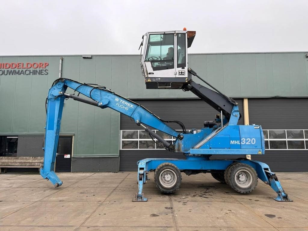 Fuchs MHL 320 - Manipulador de materiales: foto 1 Fuchs MHL 320 - Manipulador de materiales: foto 1