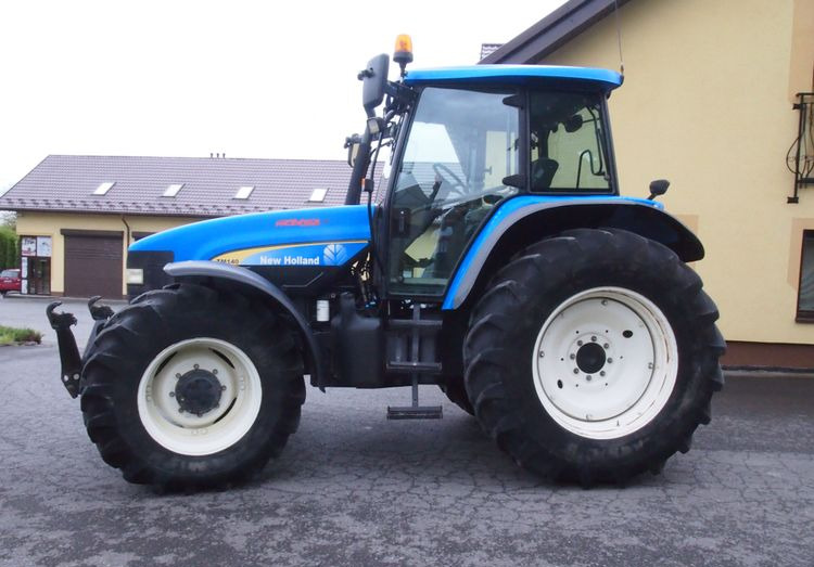 Ciągnik New Holland TM 140 2004 Przedni TUZ - Tractor: foto 5 Ciągnik New Holland TM 140 2004 Przedni TUZ - Tractor: foto 5