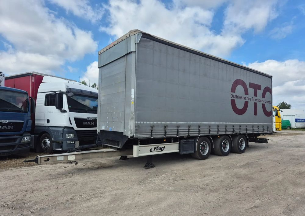 Fliegl Tandem 3 osie - Remolque con toldo: foto 1 Fliegl Tandem 3 osie - Remolque con toldo: foto 1