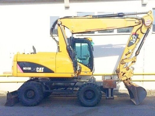 Caterpillar M 315 D - Excavadora de ruedas: foto 1 Caterpillar M 315 D - Excavadora de ruedas: foto 1
