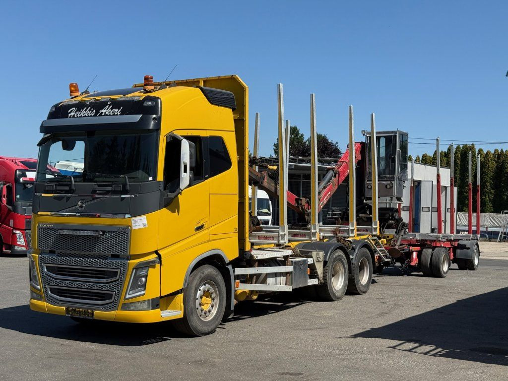 Volvo FH 16 750 6x4 + Fliegl - Camión forestal, Camión grúa: foto 1 Volvo FH 16 750 6x4 + Fliegl - Camión forestal, Camión grúa: foto 1