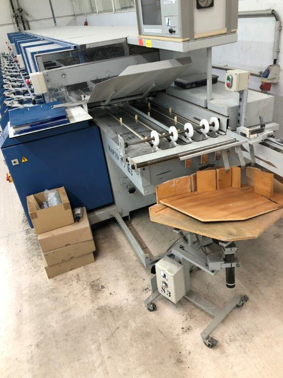 Gathering machine / booklet maker MKW Rapid UT 14B3GS + SFT 350 with 14 stations - Máquina de embalaje: foto 5 Gathering machine / booklet maker MKW Rapid UT 14B3GS + SFT 350 with 14 stations - Máquina de embalaje: foto 5