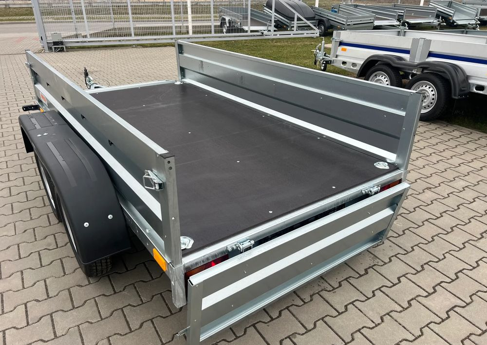 Neptun N7-253 2 rt, Gn 245,253x129 cm 2 osie - Remolque plataforma/ Caja abierta: foto 2 Neptun N7-253 2 rt, Gn 245,253x129 cm 2 osie - Remolque plataforma/ Caja abierta: foto 2