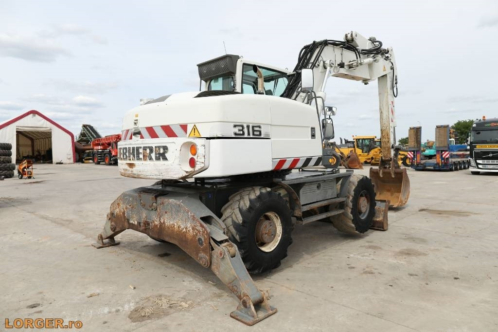 Liebherr A 316 Litronic - Excavadora de ruedas: foto 2 Liebherr A 316 Litronic - Excavadora de ruedas: foto 2