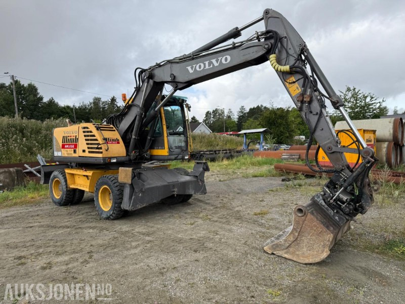 2006 Volvo EW140B Hjulgraver m/pallegaffel og skuff - Steelwrist tiltrotator. - Excavadora: foto 2 2006 Volvo EW140B Hjulgraver m/pallegaffel og skuff - Steelwrist tiltrotator. - Excavadora: foto 2