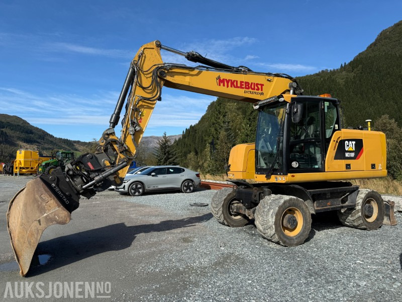 2018 Velholdt Cat M318F Hjulgraver med OilQuick Rototilt R6, 9577 timer - Excavadora: foto 1 2018 Velholdt Cat M318F Hjulgraver med OilQuick Rototilt R6, 9577 timer - Excavadora: foto 1