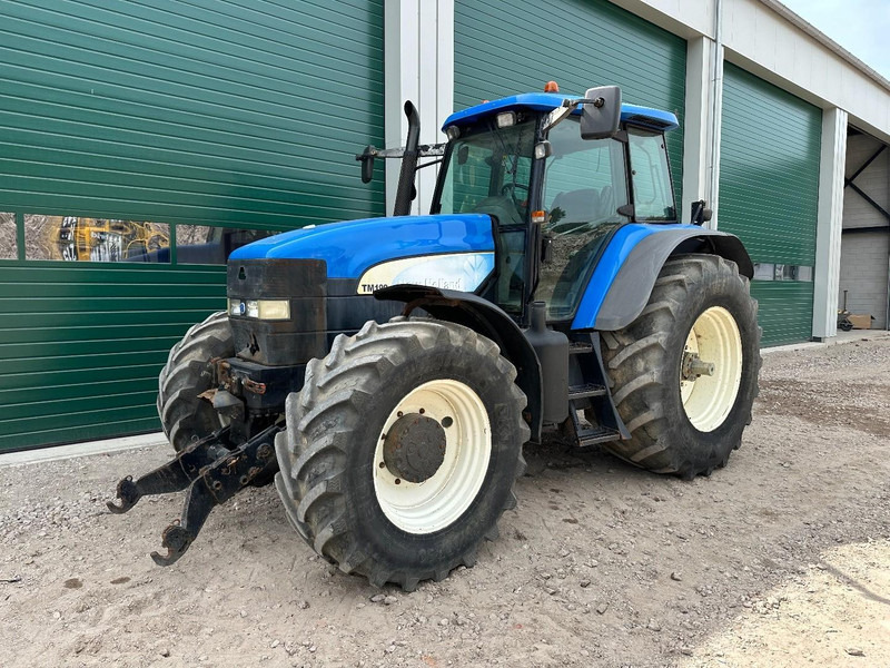 New Holland TM 190 - Tractor: foto 1 New Holland TM 190 - Tractor: foto 1