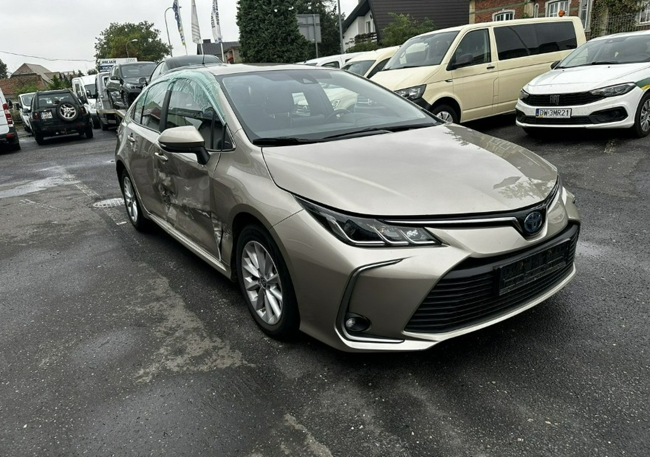 Toyota Corolla XII Corolla Sedan 1.8 Hybrid 98KM Comfort Salon PL 2022 - Sedan: foto 1 Toyota Corolla XII Corolla Sedan 1.8 Hybrid 98KM Comfort Salon PL 2022 - Sedan: foto 1