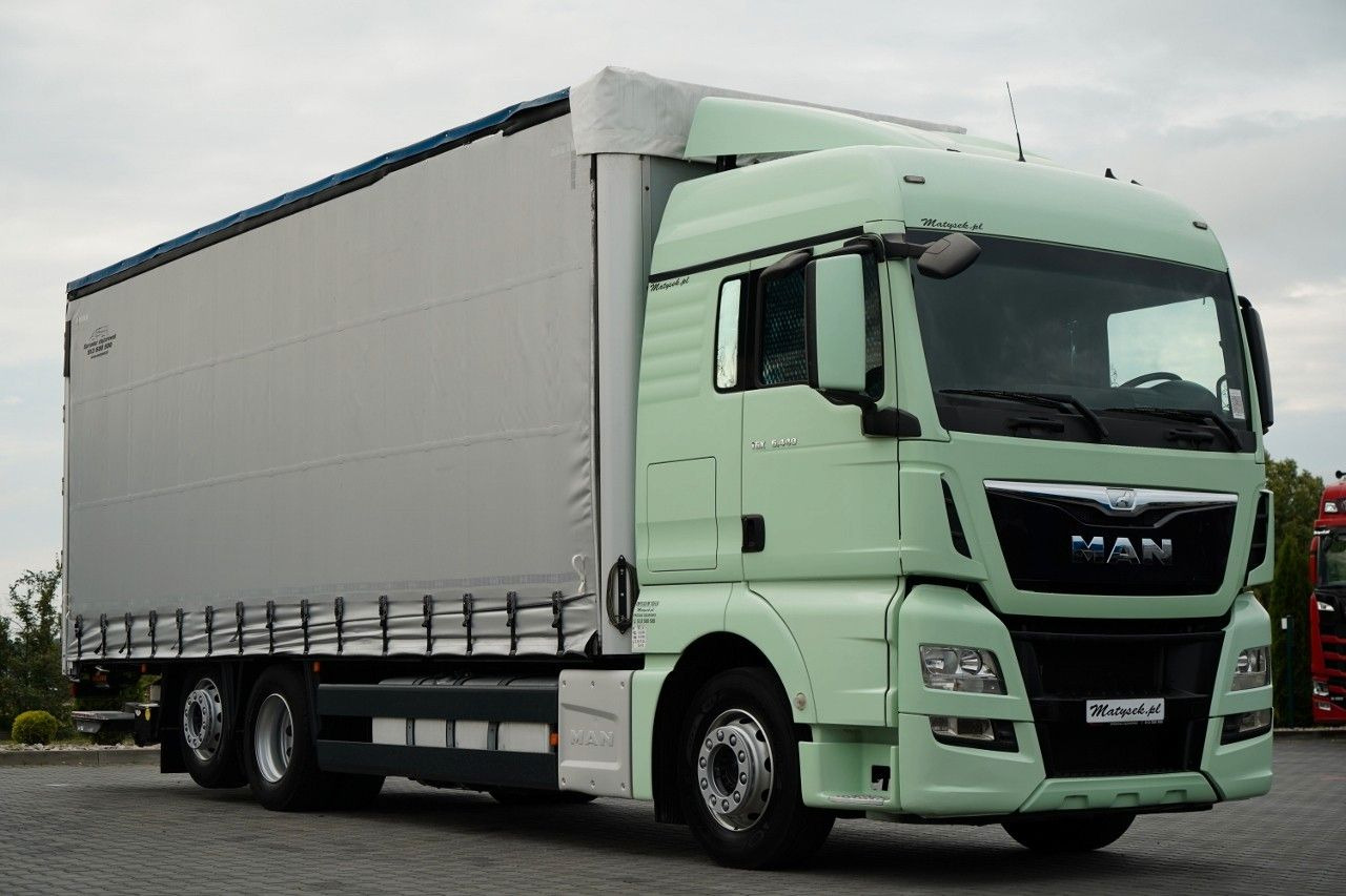 MAN TGX 26.440 / 6x2 / FIRANKA - 8,15 m / SOLÓWKA / MAN TGX 26.440 / 6x2 / FIRANKA - 8,15 m / SOLÓWKA / - Camión lona: foto 1 MAN TGX 26.440 / 6x2 / FIRANKA - 8,15 m / SOLÓWKA / MAN TGX 26.440 / 6x2 / FIRANKA - 8,15 m / SOLÓWKA / - Camión lona: foto 1
