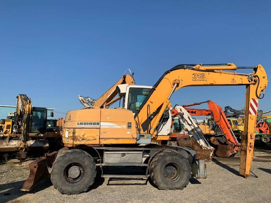 Excavadora de ruedas Liebherr A 312: foto 6