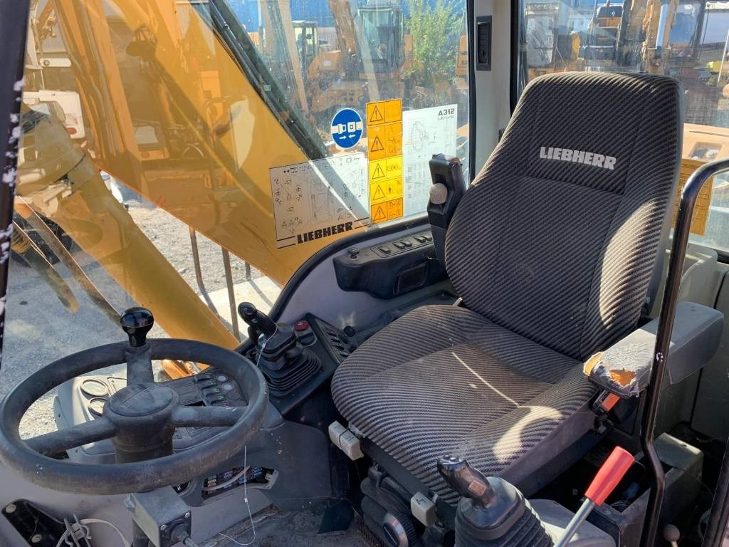 Excavadora de ruedas Liebherr A 312: foto 9