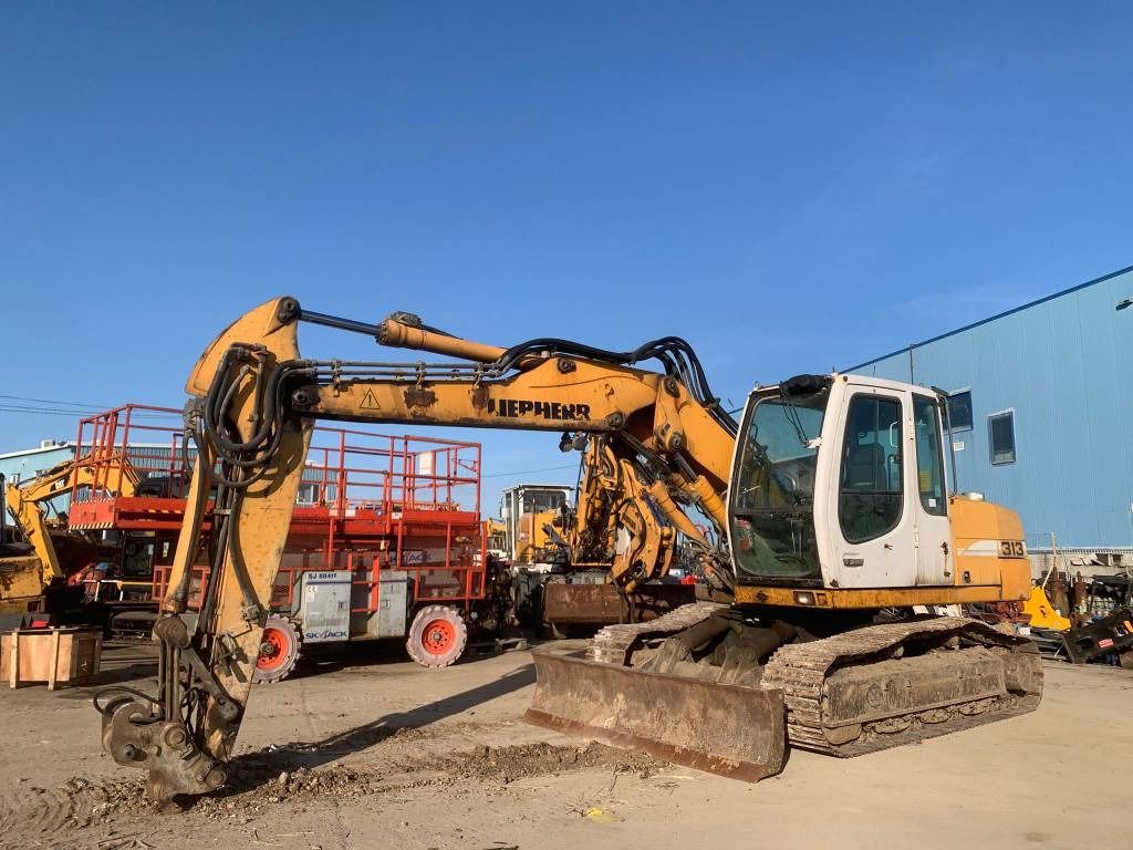 Liebherr R 313 - Excavadora de cadenas: foto 1 Liebherr R 313 - Excavadora de cadenas: foto 1