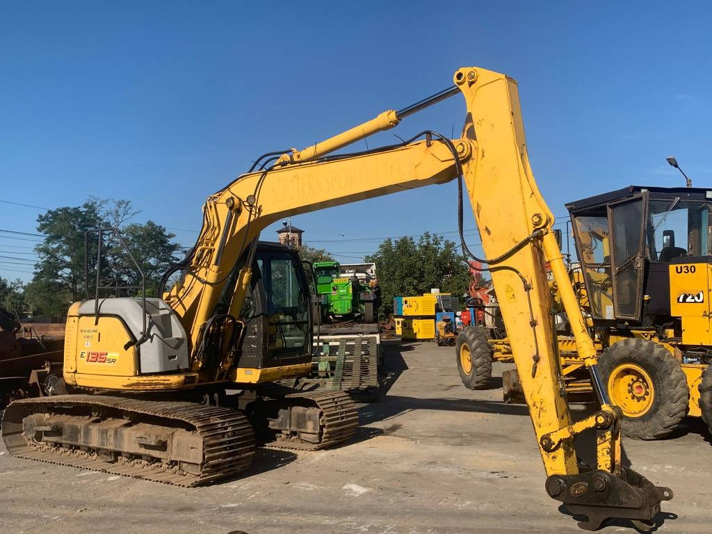 New Holland E 135 SR - Excavadora de cadenas: foto 1 New Holland E 135 SR - Excavadora de cadenas: foto 1